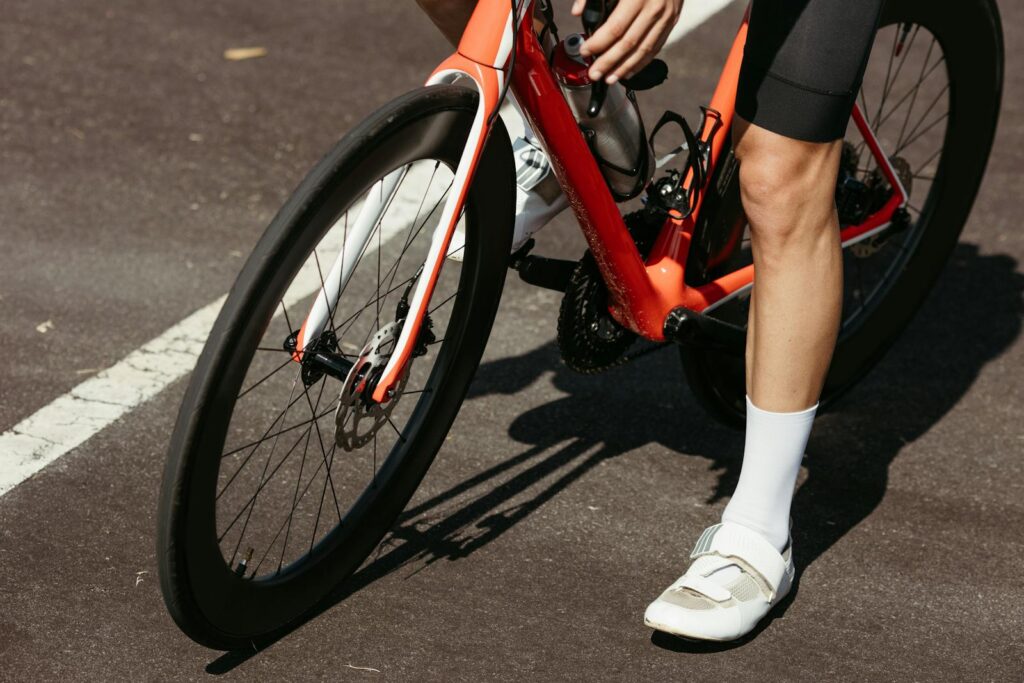 A person riding a bike on the road